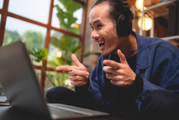 A screenshot of a popular Indonesian game streamer during a live session, engaging with their audience in the chat. The streamer's face shows enthusiasm and excitement.