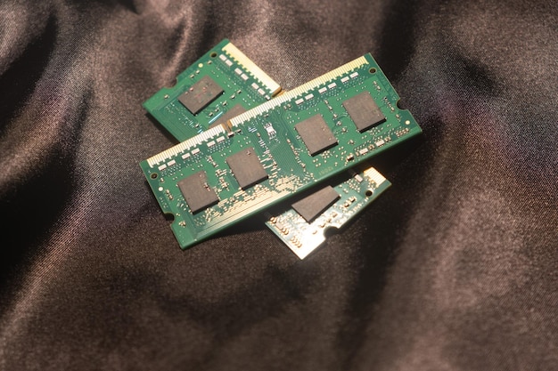 A detailed close-up shot of various PC components such as CPU, GPU, RAM, SSD, and motherboard, clearly labeled and neatly arranged on an anti-static mat, showcasing the details of each component.